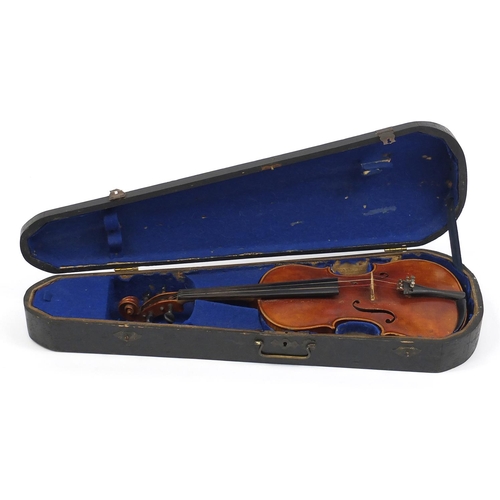 277 - Old wooden violin with scrolled neck, bearing a Mordoch & Co of London label to the interior, the vi... 