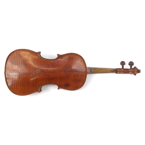 277 - Old wooden violin with scrolled neck, bearing a Mordoch & Co of London label to the interior, the vi... 