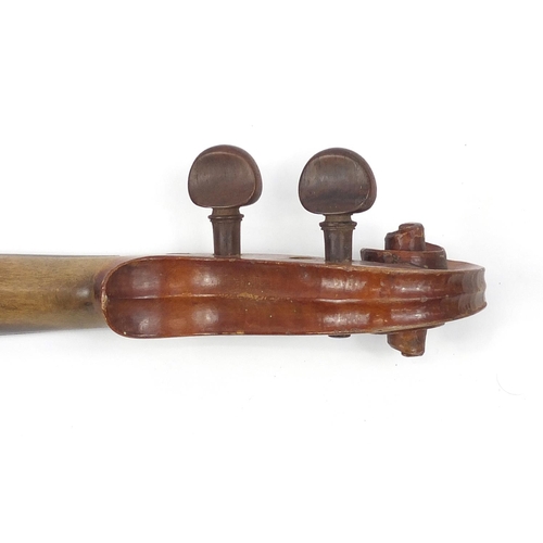 277 - Old wooden violin with scrolled neck, bearing a Mordoch & Co of London label to the interior, the vi... 