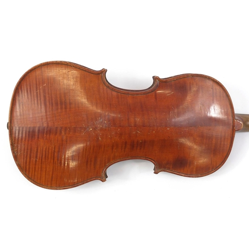 277 - Old wooden violin with scrolled neck, bearing a Mordoch & Co of London label to the interior, the vi... 