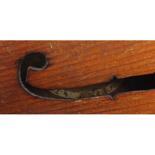 277 - Old wooden violin with scrolled neck, bearing a Mordoch & Co of London label to the interior, the vi... 