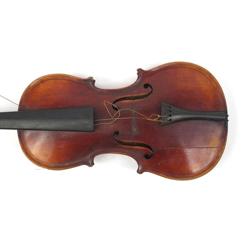 275 - Old wooden violin with scrolled neck, bearing a Giovan Paolo Maggini label to the interior, with vel... 