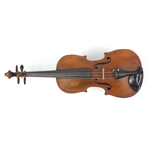 276 - Old wooden violin with one piece back and scrolled neck, together with two unnamed violin bows and f... 