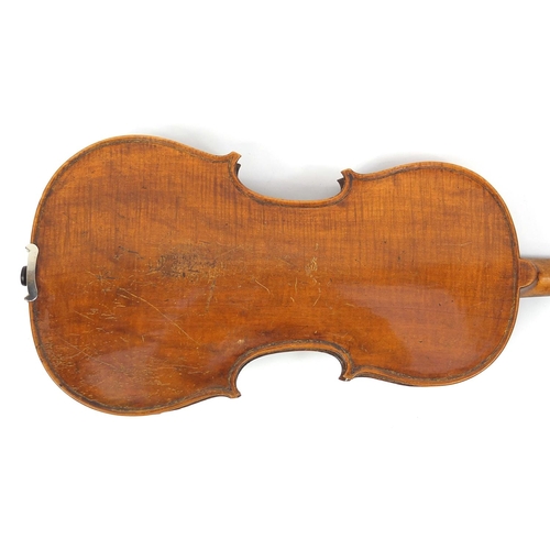 276 - Old wooden violin with one piece back and scrolled neck, together with two unnamed violin bows and f... 