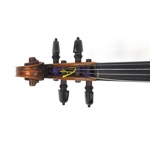 276 - Old wooden violin with one piece back and scrolled neck, together with two unnamed violin bows and f... 