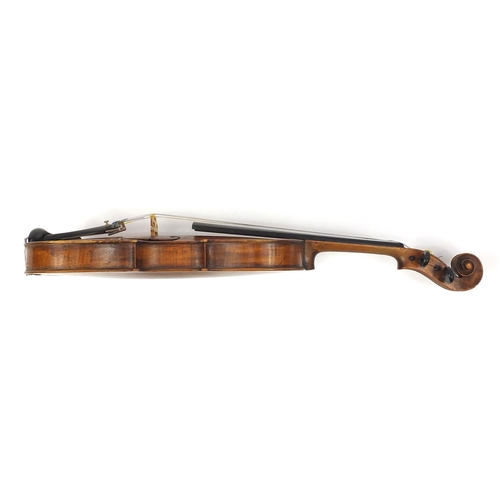 276 - Old wooden violin with one piece back and scrolled neck, together with two unnamed violin bows and f... 