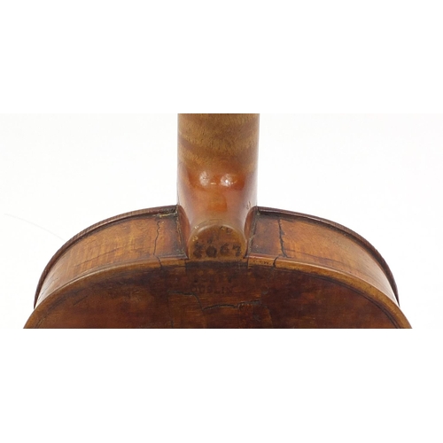 274 - Old wooden violin with one piece back and scrolled neck, with fitted hardwood carrying case, the vio... 