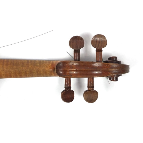 274 - Old wooden violin with one piece back and scrolled neck, with fitted hardwood carrying case, the vio... 