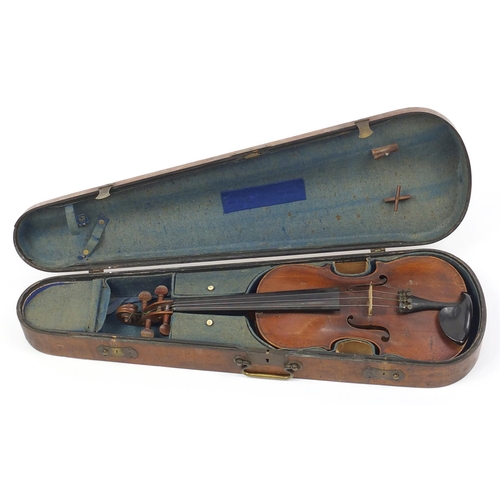 274 - Old wooden violin with one piece back and scrolled neck, with fitted hardwood carrying case, the vio... 