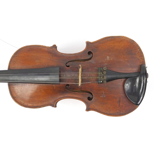 274 - Old wooden violin with one piece back and scrolled neck, with fitted hardwood carrying case, the vio... 