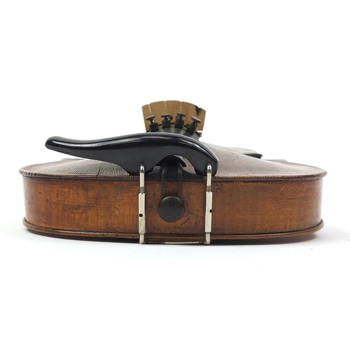 274 - Old wooden violin with one piece back and scrolled neck, with fitted hardwood carrying case, the vio... 