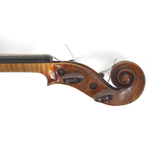 274 - Old wooden violin with one piece back and scrolled neck, with fitted hardwood carrying case, the vio... 