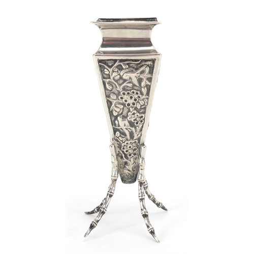 524 - Chinese silver vase of square tapering form with simulated bamboo legs, embossed with birds of parad... 