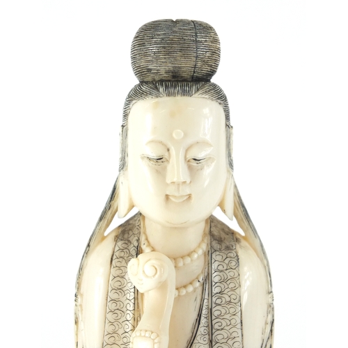 502 - Chinese finely carved ivory okimono of a female wearing a robe on a hardwood stand, 21.5cm high