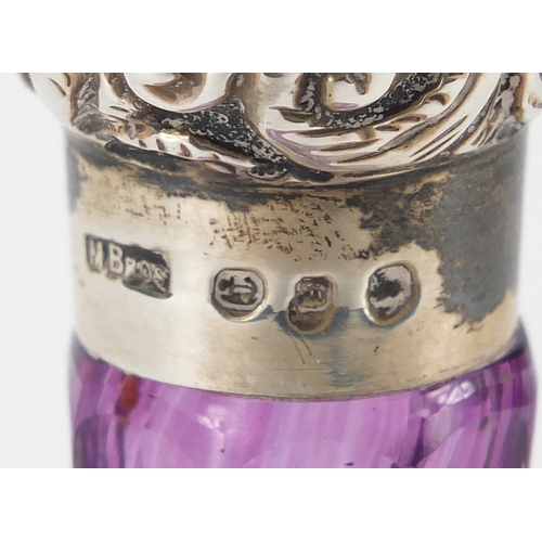 19 - Victorian purple and clear glass silver topped scent bottle, the silver top embossed with foliage, M... 