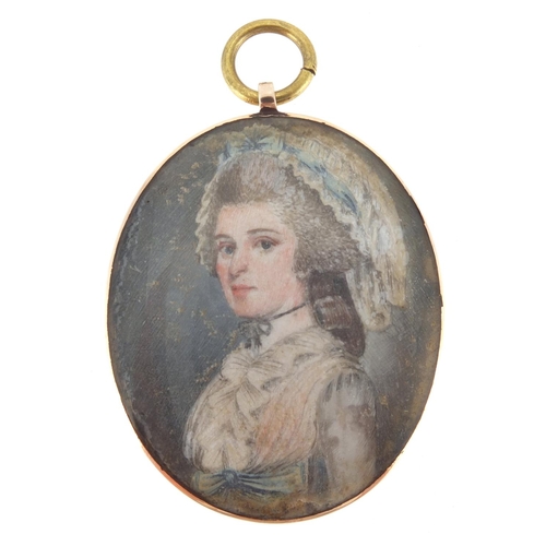 34 - 18th century oval hand painted portrait miniature onto ivory of a young lady, wearing a cap, housed ... 