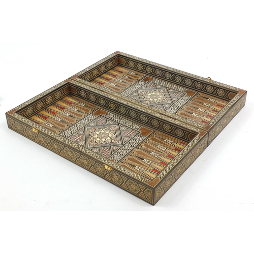 2122 - Vizagapatum style inlaid folding backgammon games board, 54cm wide when closed