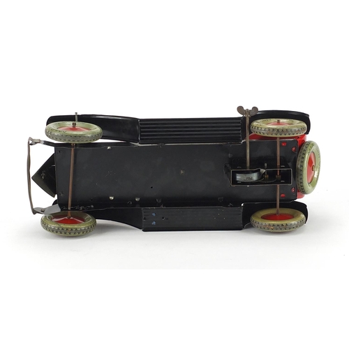 406 - Tin plate clockwork saloon car with Michelin cord tyres, with box, 36cm in length