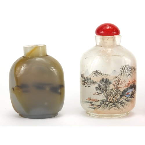 487 - Five Chinese snuff bottles including two glass examples hand painted to the interior, one with a riv... 