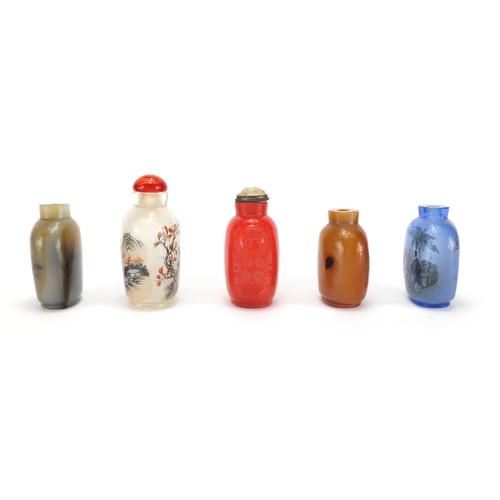 487 - Five Chinese snuff bottles including two glass examples hand painted to the interior, one with a riv... 