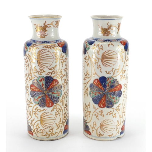 421 - Pair of Chinese porcelain cylindrical vases, possibly Kangxi period, both hand painted in the Imari ... 