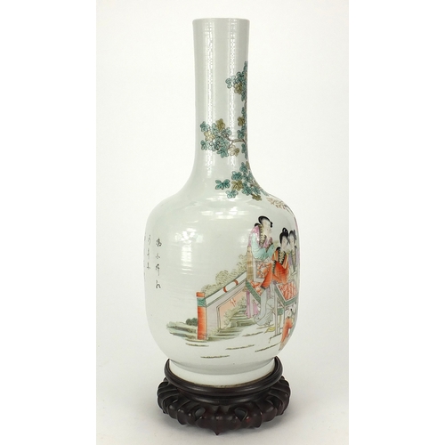 429 - Chinese porcelain bottle vase hand on hardwood stand, painted in the famille rose palette with figur... 