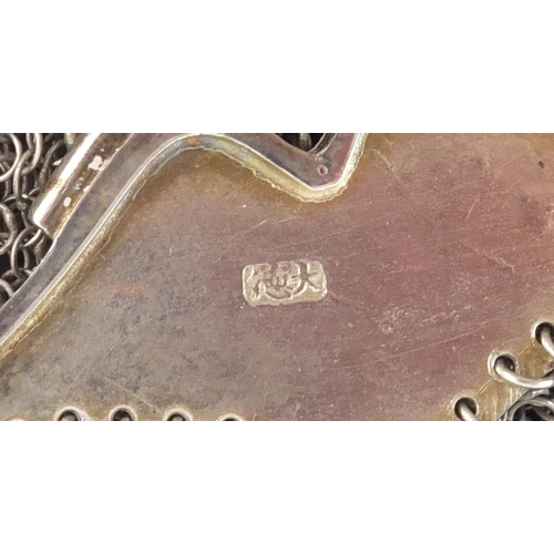 525 - Chinese silver purse engraved with flowers, character marks to the interior, 20cm in length, approxi... 