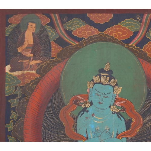 540 - Two Tibetan watercolour on silk Thang-Ga, both with deities, the largest 70cm x 49cm