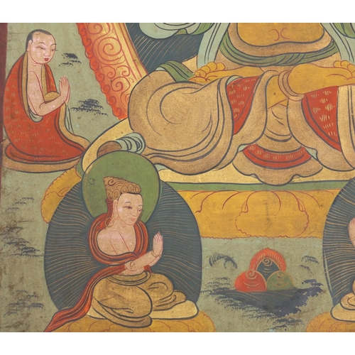 540 - Two Tibetan watercolour on silk Thang-Ga, both with deities, the largest 70cm x 49cm