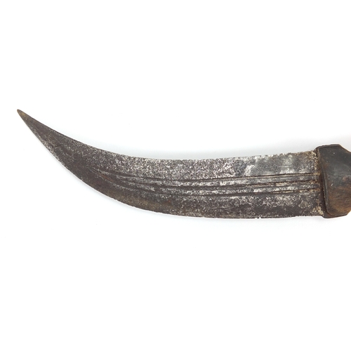 580 - Middle Eastern knife with sheath and horn handle, possibly rhino horn, 35cm in length