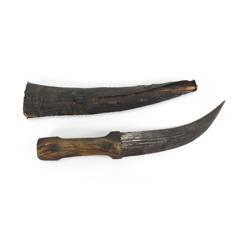 580 - Middle Eastern knife with sheath and horn handle, possibly rhino horn, 35cm in length