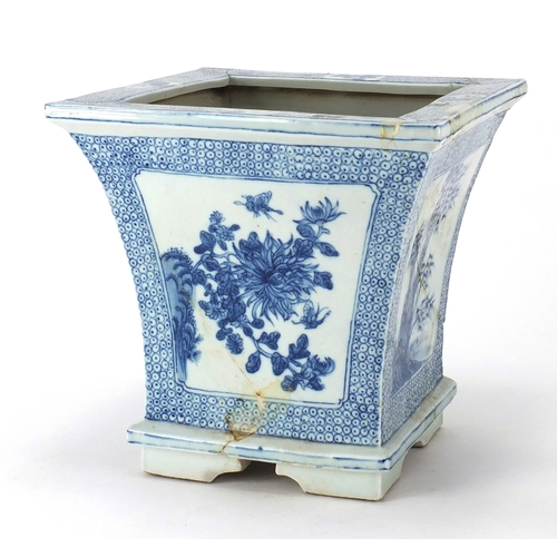 450 - Chinese blue and white porcelain planter of Tapering form, hand painted with panels of flowers and b... 