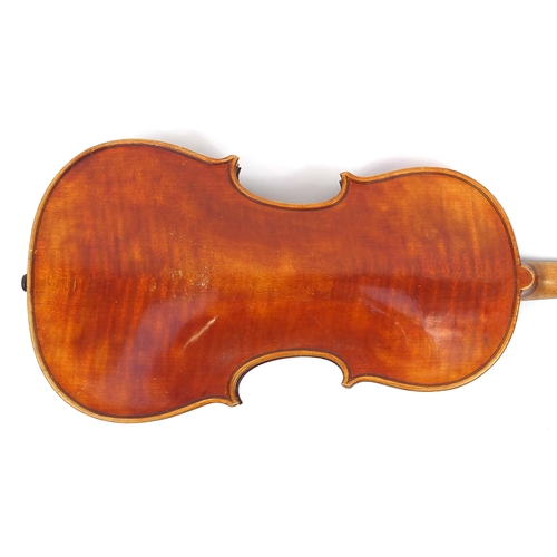 278 - Old wooden violin bearing a Stradivarius and The London Co label to the interior, with wooden carryi... 