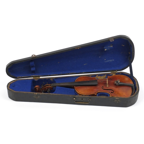 278 - Old wooden violin bearing a Stradivarius and The London Co label to the interior, with wooden carryi... 