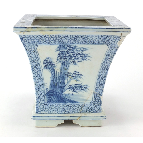 450 - Chinese blue and white porcelain planter of Tapering form, hand painted with panels of flowers and b... 