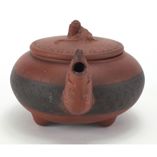 462 - Chinese Yixing terracotta teapot with dragon spout and incised decoration, impressed marks to the ba... 