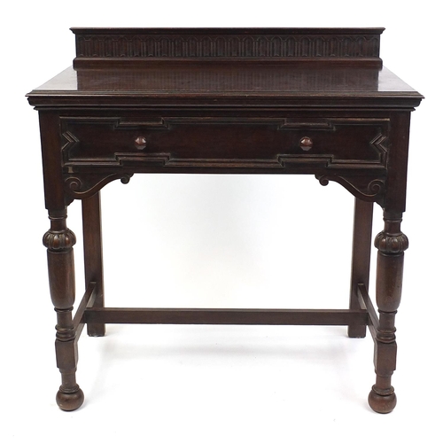 2023 - Jacobean style carved  oak hall table fitted with a frieze drawer, 96cm H x 90cm W x 51cm D