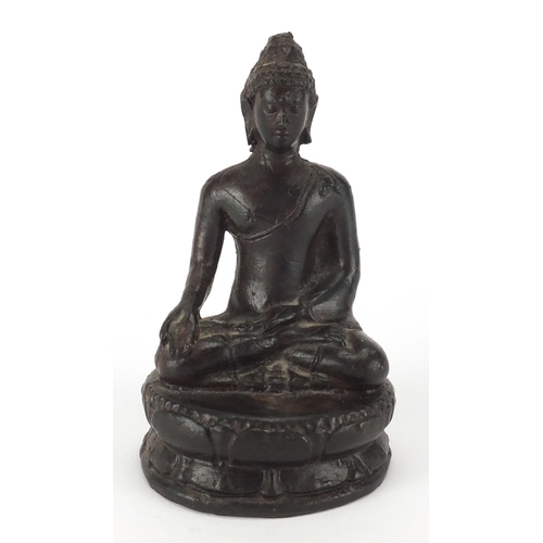 470 - Tibetan painted metal figure of Buddha seated in the lotus position, 13cm high