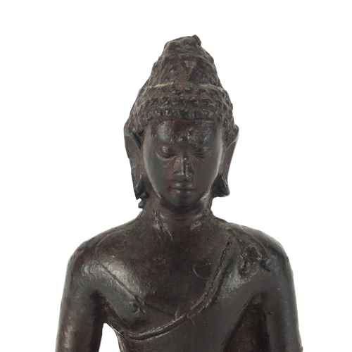 470 - Tibetan painted metal figure of Buddha seated in the lotus position, 13cm high