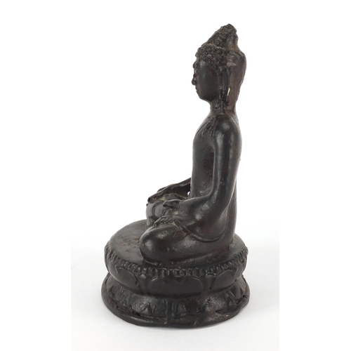 470 - Tibetan painted metal figure of Buddha seated in the lotus position, 13cm high