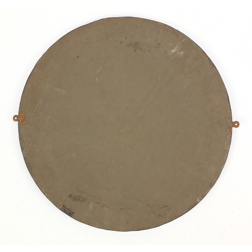 697 - Arts and Crafts Copper framed mirror relief moulded with flowers, 60cm in diameter