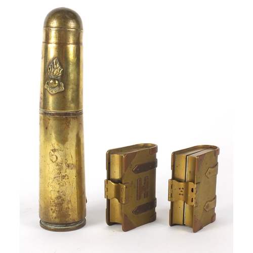 327 - British Military interest trench art including a large lighter with Royal Artillery Insignia and two... 