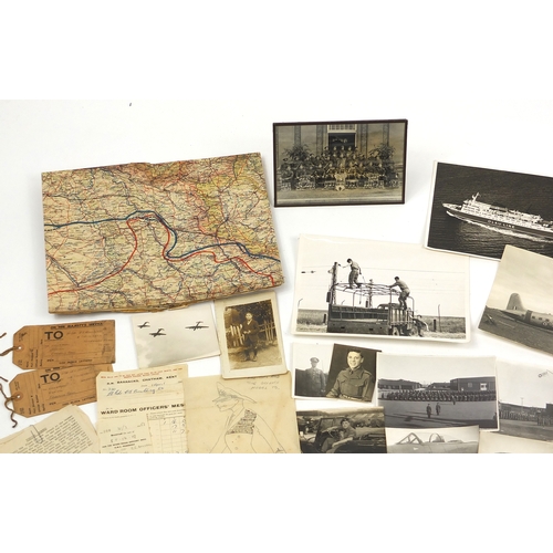 319 - Military interest ephemera and photographs including a fold out map, photographs of ships, planes an... 