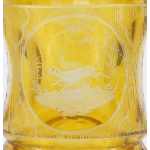 20 - 19th century Bohemian amber flashed cut glass scent bottle, etched with panels of stags, dogs and fl... 
