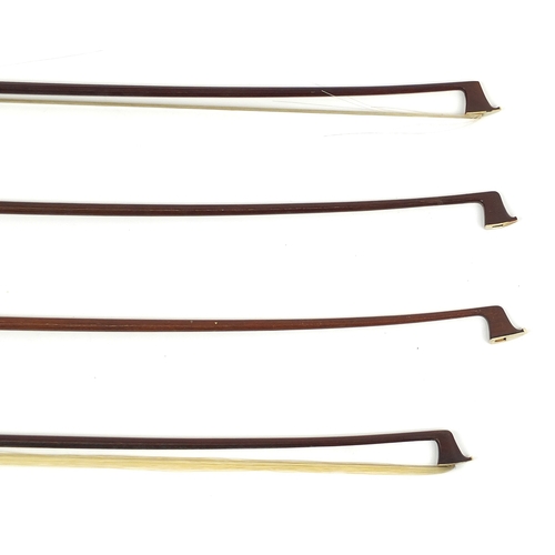 282 - Four wooden violin bows, the largest 76cm in length