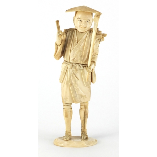 504 - Japanese carved ivory okimono of a fisherman, 17cm high