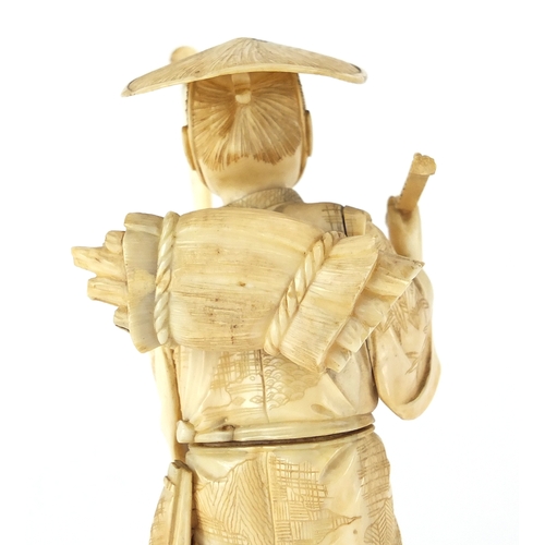 504 - Japanese carved ivory okimono of a fisherman, 17cm high