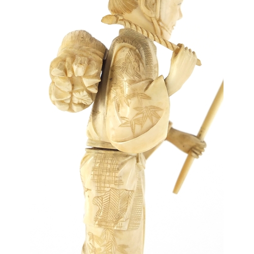 504 - Japanese carved ivory okimono of a fisherman, 17cm high