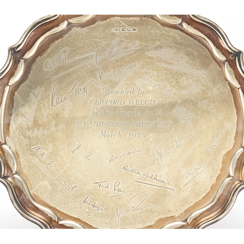 720 - Circular silver three footed salver with presentation inscription and engraved signatures, BD Sheffi... 