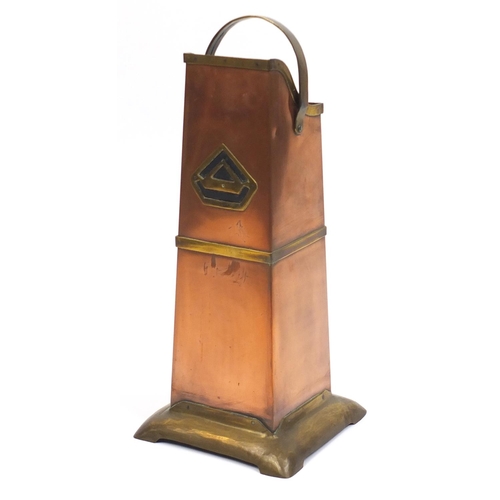 2040 - Arts & Crafts copper and brass stick stand with swing handle, 52cm high